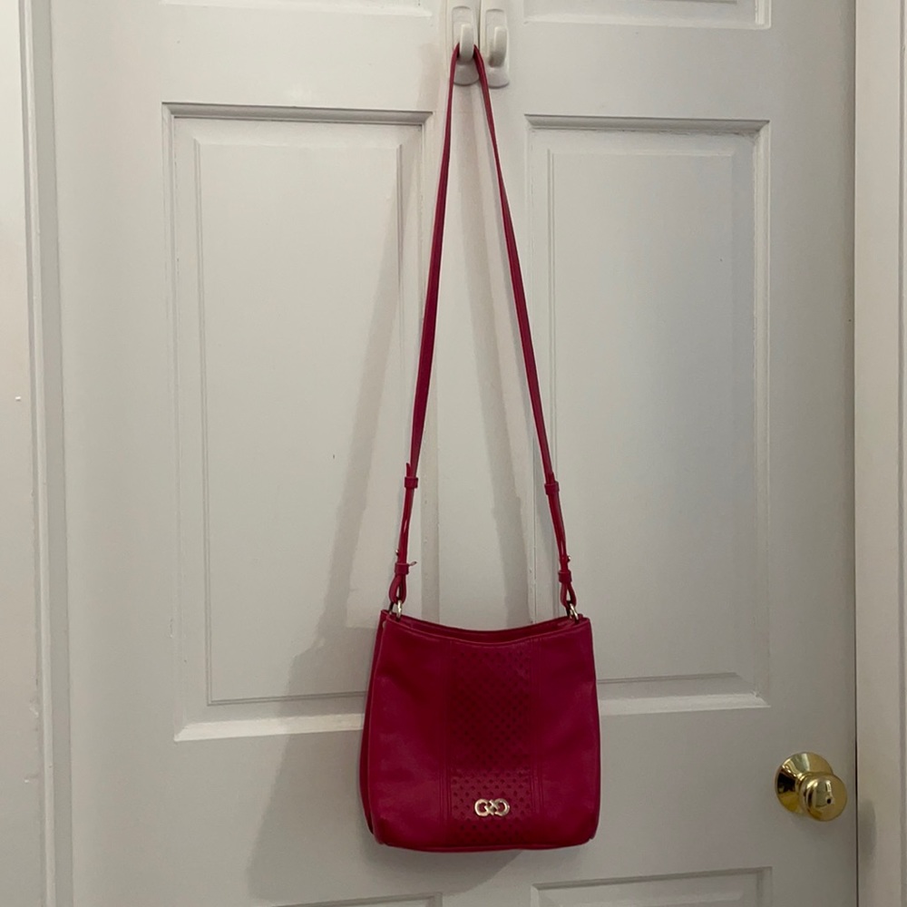 Cole Haan cross body bag. Deep rose pink. EUC